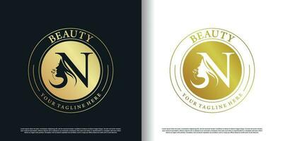 Initiale n Logo Design mit Schönheit Frauen Symbol und kreativ Konzept Prämie Vektor