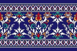 Ikat Blumen- Paisley Stickerei auf Blau hintergrund.ikat ethnisch orientalisch Muster traditionell.aztekisch Stil abstrakt Vektor illustration.design zum Textur, Stoff, Kleidung, Verpackung, Dekoration, Sarong, Schal.