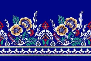 Ikat Blumen- Paisley Stickerei auf Blau hintergrund.ikat ethnisch orientalisch Muster traditionell.aztekisch Stil abstrakt Vektor illustration.design zum Textur, Stoff, Kleidung, Verpackung, Dekoration, Sarong, Schal.
