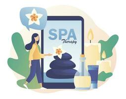 spa terapi app. skönhet procedur och kropp vård. Tillbehör för avkopplande atmosfär, ljus, arom oljor, varm stenar. mycket liten flicka med stor smartphone. modern platt tecknad serie stil. vektor illustration