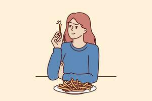 kvinna äter franska frites utan tänkande handla om hälsa risker av snabb mat och friterad snacks. flicka är har lunch i Kafé Sammanträde på tabell med franska frites och behov samråd med dietist vektor