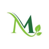 första brev m med blad lyx logotyp. grön blad logotyp mall vektor design.