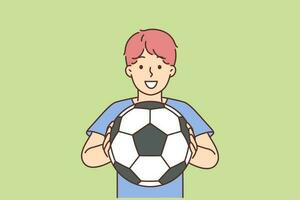 heiter Junge von Schule Alter halten Fußball Ball und lächelnd bietet an zu abspielen Fußball. positiv Junge Fußball Spieler Träume von Werden Fachmann Sportler und teilnehmen im Premier Liga vektor