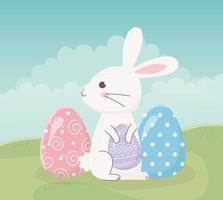 lycklig påsk sitter kanin med ägg på gräs firande vektor