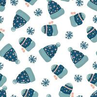 vinter- sömlös mönster med hatt, vantar och snöflingor. på en vit bakgrund, i en ritad för hand stil. vektor