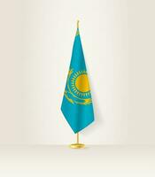 kazakhstan flagga på en flagga stå. vektor