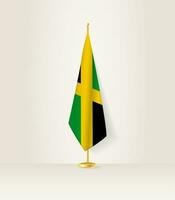 Jamaika Flagge auf ein Flagge Stand. vektor
