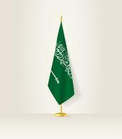 Saudi Arabien Flagge auf ein Flagge Stand. vektor