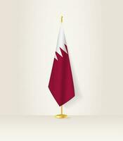 Katar Flagge auf ein Flagge Stand. vektor