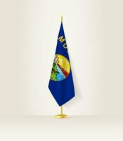 Montana Flagge auf ein Flagge Stand. vektor