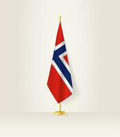 Norwegen Flagge auf ein Flagge Stand. vektor
