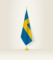 Sverige flagga på en flagga stå. vektor