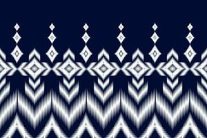 nahtlos Muster von Ikat Paisley, traditionell nahtlos Muster, Blau Hintergrund, aztekisch Stil, Stickerei, abstrakt, Vektor, Design Illustration zum Textur, Stoff, drucken. vektor