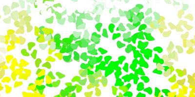 ljusgrön, gul vektorbakgrund med kaotiska former. vektor