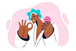 kvinna med bad bomba i händer visar gest av ok och ler, kallelse för använda sig av av aromaterapi för föryngring. afrikansk amerikan flicka beröm bad bomba och spa eller hygienisk förfaranden vektor
