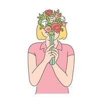 en kvinna håller en blomma i handen och täcker ansiktet. vektor