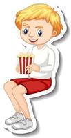 klistermärke design med karaktär av en pojke som sitter och äter popcorn vektor