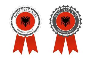 två modern vektor tillverkad i albania etiketter isolerat på vit bakgrund, enkel klistermärken i nian färger, premie kvalitet stämpel design, flagga av albania