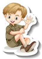 eine Aufklebervorlage mit einem Jungen im Safari-Outfit-Cartoon-Charakter vektor