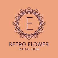 brev e retro blomma första vektor logotyp design