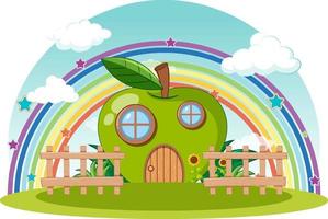 grünes Apfelhaus mit Regenbogen am Himmel vektor