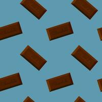 mönster med barer bitar av choklad i blå bakgrund. vektor