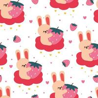 sömlös mönster tecknad serie kanin innehav en jordgubb på en rosa moln. söt djur- tapet illustration för gåva slå in papper vektor