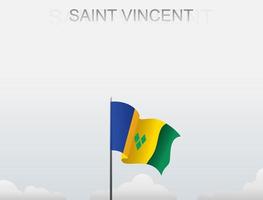flagge von saint vincent und die grenadinen, die unter dem weißen himmel fliegen vektor