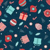 jul sömlös mönster med en gåva, en boll, en prydnadssak, sötsaker, och snöflinga på en blå bakgrund. perfekt för Semester inbjudningar, vinter- hälsning kort, tapet och gåva papper vektor