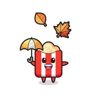 Cartoon des süßen Popcorns, das im Herbst einen Regenschirm hält vektor