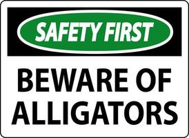 Sicherheit zuerst Zeichen in acht nehmen von Alligatoren vektor