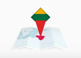Litauen ist abgebildet auf ein gefaltet Papier Karte und festgesteckt Ort Marker mit Flagge von Litauen. vektor