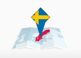 Schweden ist abgebildet auf ein gefaltet Papier Karte und festgesteckt Ort Marker mit Flagge von Schweden. vektor