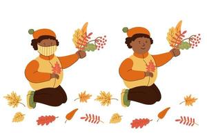kleiner afroamerikanischer Junge, der bunte Herbstblätter sammelt vektor