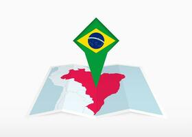 Brasilien ist abgebildet auf ein gefaltet Papier Karte und festgesteckt Ort Marker mit Flagge von Brasilien. vektor