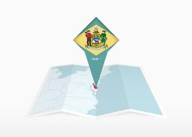 delaware är avbildad på en vikta papper Karta och fästs plats markör med flagga av delaware. vektor