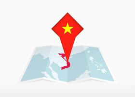 Vietnam ist abgebildet auf ein gefaltet Papier Karte und festgesteckt Ort Marker mit Flagge von Vietnam. vektor