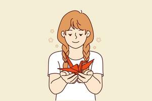 wenig Mädchen hält Origami Schwan im Hände, gemacht zusammen mit Schule Lehrer beim Lektion im kreativ Fähigkeiten. glücklich Teenager Kind ist süchtig zu Origami, und zeigt an Fälschung symbolisieren Frieden und der Wohlstand vektor