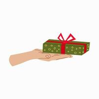 geben ein Geschenk. Hand mit Geschenk Box Design zum Banner, Netz. Grün Geschenk Box auf Hand. Vektor Illustration...