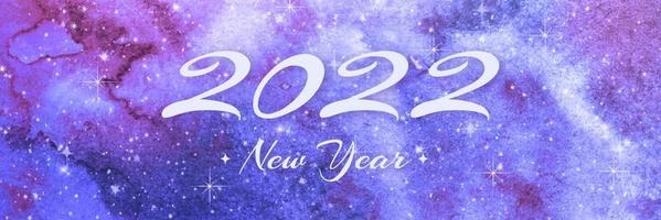 2022 Neujahrsgrußkartendesign. Kalligraphie Nummer 2022 Schriftzug auf Aquarell Galaxie Hintergrund. Typografie-Grafik-Vektor-Illustration vektor