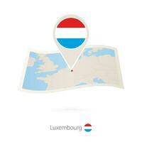 vikta papper Karta av luxemburg med flagga stift av luxembourg. vektor