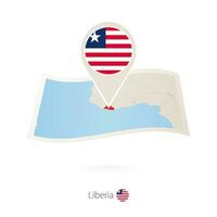 vikta papper Karta av Liberia med flagga stift av liberia. vektor