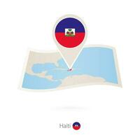 vikta papper Karta av haiti med flagga stift av haiti. vektor