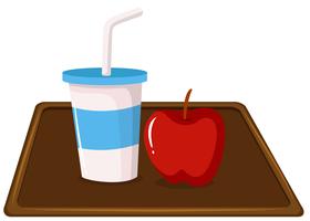 Apple och en milkshake i bricka vektor