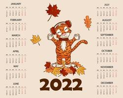 Kalenderentwurfsvorlage für 2022, das Jahr des Tigers nach dem chinesischen oder östlichen Kalender, mit einer Abbildung des Tigers. horizontale Tabelle mit Kalender für 2022. Vektor