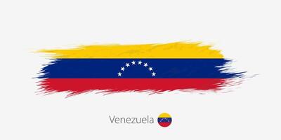 flagga av venezuela, grunge abstrakt borsta stroke på grå bakgrund. vektor
