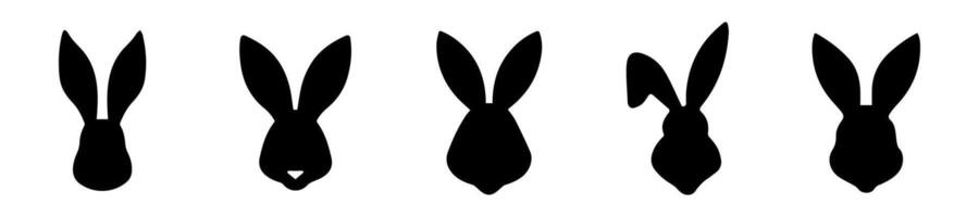 einstellen von Silhouetten von Hase Köpfe. Ostern Hasen. isoliert auf Weiß Hintergrund. ein einfach schwarz Symbole von Hasen. süß Tiere. Ideal zum Logo, Emblem, Piktogramm, drucken, Design Element vektor