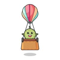 melon maskot rider en luftballong vektor