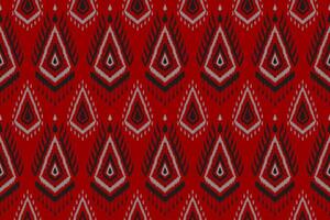 tyg etnisk ikat konst. sömlös mönster i stam. aztec geometrisk prydnad skriva ut. röd bakgrund. vektor