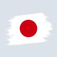 flagga av Japan, borsta stroke bakgrund vektor